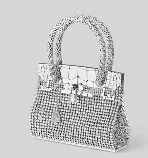 印度首富的妻子盛裝出席派對<strong></p>
<p>金屬制品廠
</strong>，拎的愛馬仕包鑲了3000多顆鉆石:金屬制品廠
